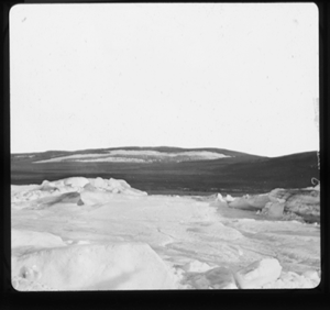 Image of Snowy foreground, tundra beyond